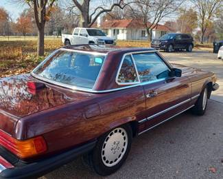 A view of the super nice 1987 Mercedes 560 SL that we have for sale - Come take a look.  It is a very nice low mileage car. Removable hardtop.  