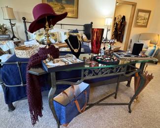 Hats, jewelry, and so much more.  This glass top sofa table is a winner too!