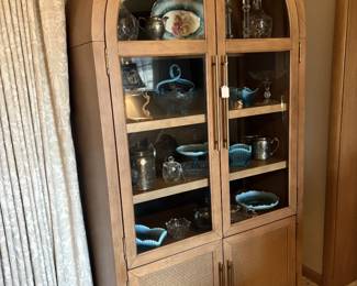 Curved modern double door china cabinet.
