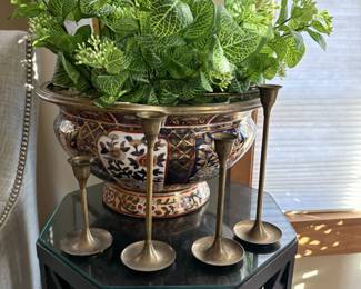 Beautiful Asian porcelain bowl on one of two matching end tables.