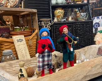 vintage carolers, wooden boat, baskets, thermometer, glass jar