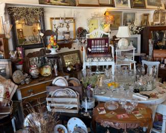 Framed and unframed art, vintage dishes, tables, florals