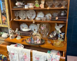 hand stitched tea towels, plates, glassware, figurines