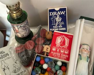 Bedroom 2, old games and 1920s porcelain doll from Japan