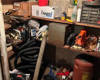 Basement, under stairs closet with tools