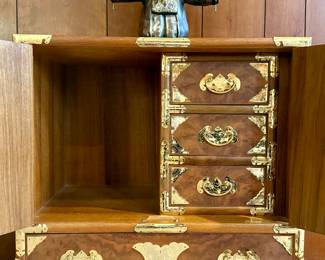 detail - 3 drawers inside, storage area and longer bottom drawer