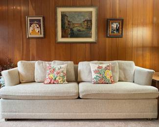 Ivory Berber Upholstered Two Cushion Sleeper Sofa with 6 Back Pillows - features ball casters