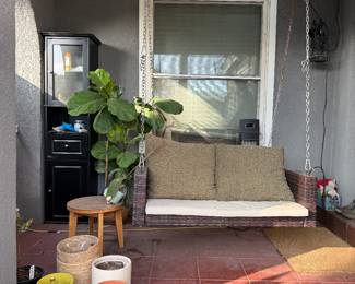 Wood swing chair and colorful pots