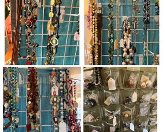 Hundreds of jewelry items - earrings, necklaces. bracelets pins etc.