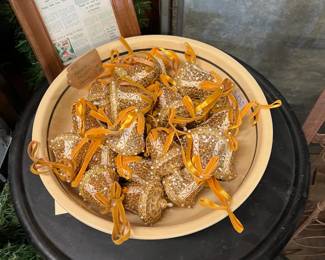 Hand decorated golden bells ornaments