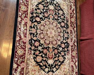 Wool and silk coffee table rug