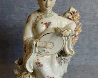 Intricately Detailed Japanese Musician Sculpture