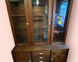 Goodsized Wood Hutch With Glass Doors And Sweet Ceramic Pulls