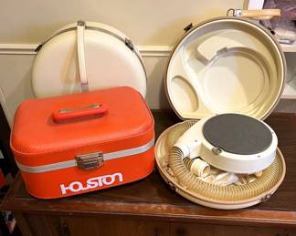 Orange Case and White Cases with Hairdryers