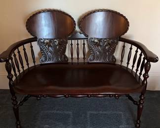 Vintage Ornate Dark Wood Bench With Spindle Back And Carved Seat. Unknown Maker.