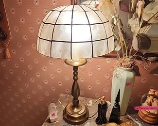 Capital shell and brass lamp