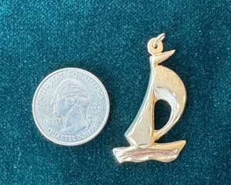 Lot#65 14k gold sailboat pendant