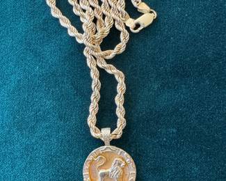 Lot#82 14k gold lion medallion necklace 19.5” chain