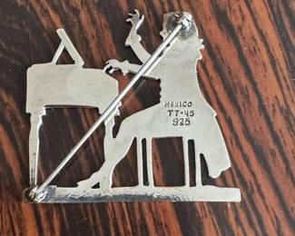 Lot#111 Now $48 - Was $65 Mexican silver pianist silhouette brooch 1 3/4"h weight:13.2 grams