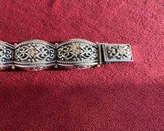 Lot#119 Now $165 - Was $225.00 Arts Elegance sterling w/14k accents bracelet 7.25” long weight: 43.3 grams