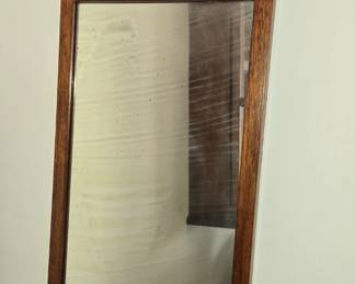 antique picture over mirror