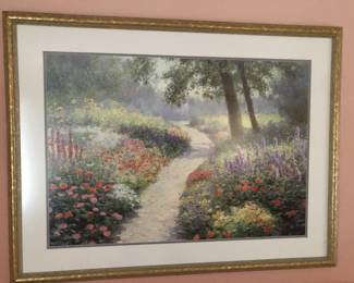 Nicely framed print of a garden path.