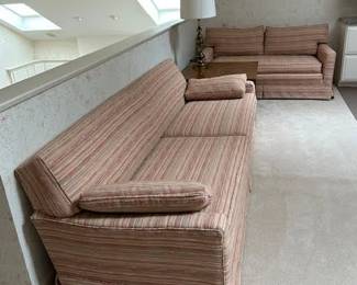 1950's couch that's been professionally reupholstered several times in it's lifetime. Matching loveseat.