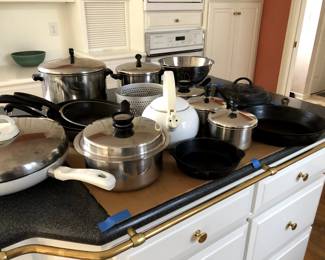 Cookware: pots and pans including wrought iron, and other glass cookware, tins and cutting boards.