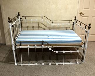 Antique wrought iron and brass day bed. Custom mattress.