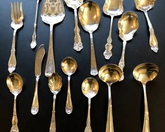 Silver plated serving pieces. There is more silverware, including Wm Rogers and a set of Towle sterling service for 8.