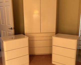 Lane Armoire and matching bedside dressers in a cream lacquer.