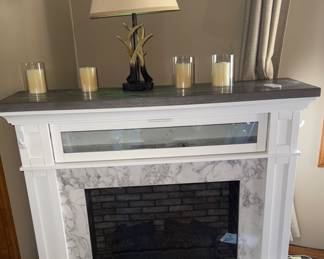 Electric fireplace Media Mantle - measurements are 39.5"H x 51"W x 15.5"D - Like new
