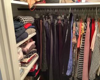 Woman’s clothing , clean with tags vintage table, lots of night. gowns with tags 