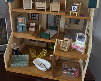 Vintage doll house with furniture