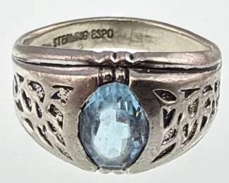 Sterling ring with blue stone (probably topaz)