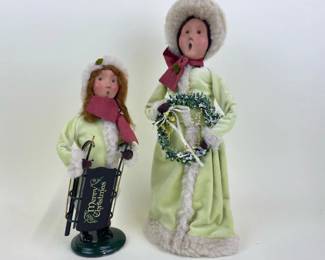 Mother and Daughter Byers' Choice carolers in chartreuse coats