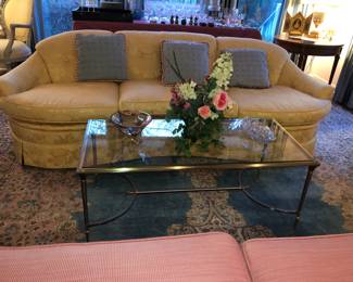 Fine gold sofa, brass coffee table 