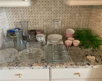 Miscellaneous glassware, serving trays, vases, and kitchen items