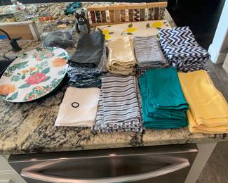 Cloth, napkins, and decorative kitchen item shown in photo