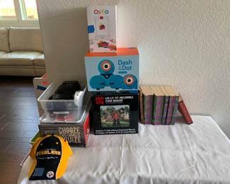 Steelers hat, remote control card, books, inflatable team mascot, dash and dot robot missing the charger, osmo genius set