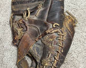 Old, vintage Mickey Mantel ball glove.  We’d like to tell you this was actually Mickey’s glove but that would be embellishing just a little bit. Actually probably be a lot of embellishing. It is old though and it does bear Mickey’s name. All the old Mickey Mantel gloves are highly sought. 