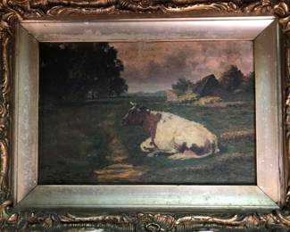 Antique oil painting of a cow signed