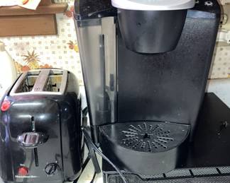 2 Keurigs available, toaster, fryer, and other small appliances.