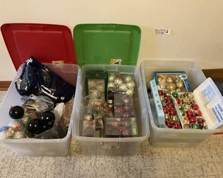 Glass ornaments including shiny brite; also Saints black and gold, and LSU purple and gold ornaments