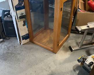 Glass and Oak display cabinet with glass shelves.