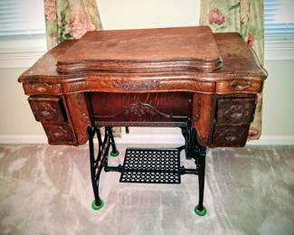Sewing machine in cabinet