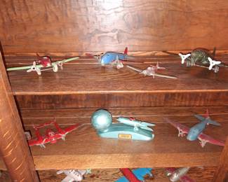 Antique tin and metal airplane toys