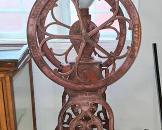 Antique iron coffee grinder