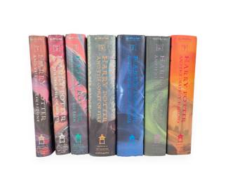 A Complete Set of Seven Harry Potter Hardcover Books by J.K. Rowling, Published by Arthur A. Levine Books and Scholastic Press
