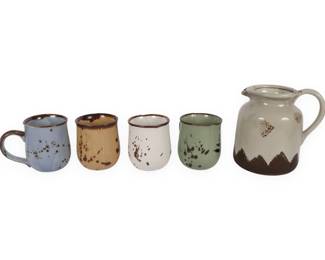 A Set of Contemporary Studio Pottery Comprising a Pitcher and Four Mugs